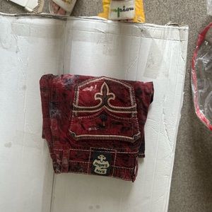 Red and black rock revival faded jeans